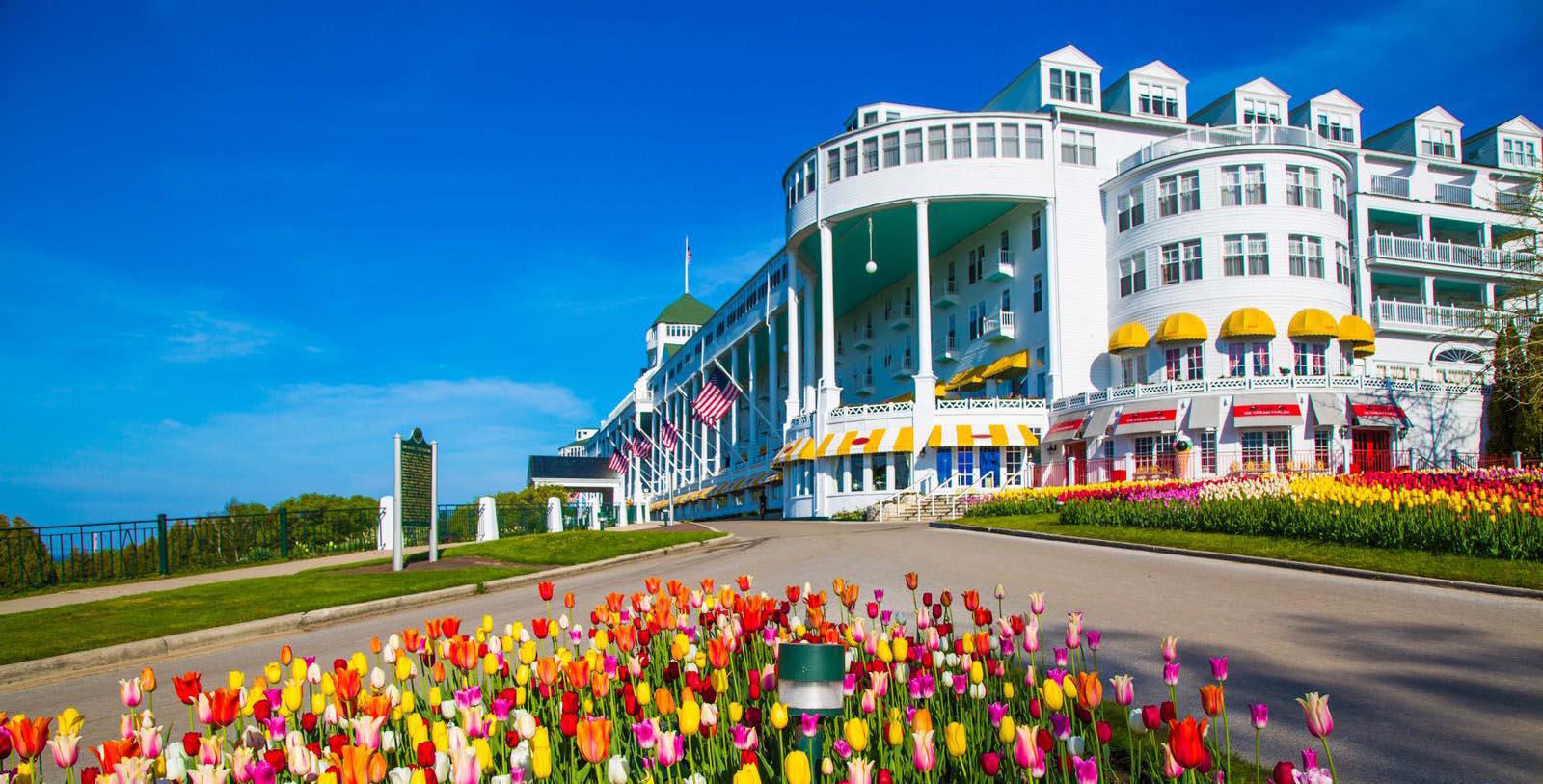 Image of hotel exterior at Grand Hotel, 1887, Member of Historic Hotels of America, in Mackinac Island, Michigan, Special Offers, Discounted Rates, Families, Romantic Escape, Honeymoons, Anniversaries, Reunions