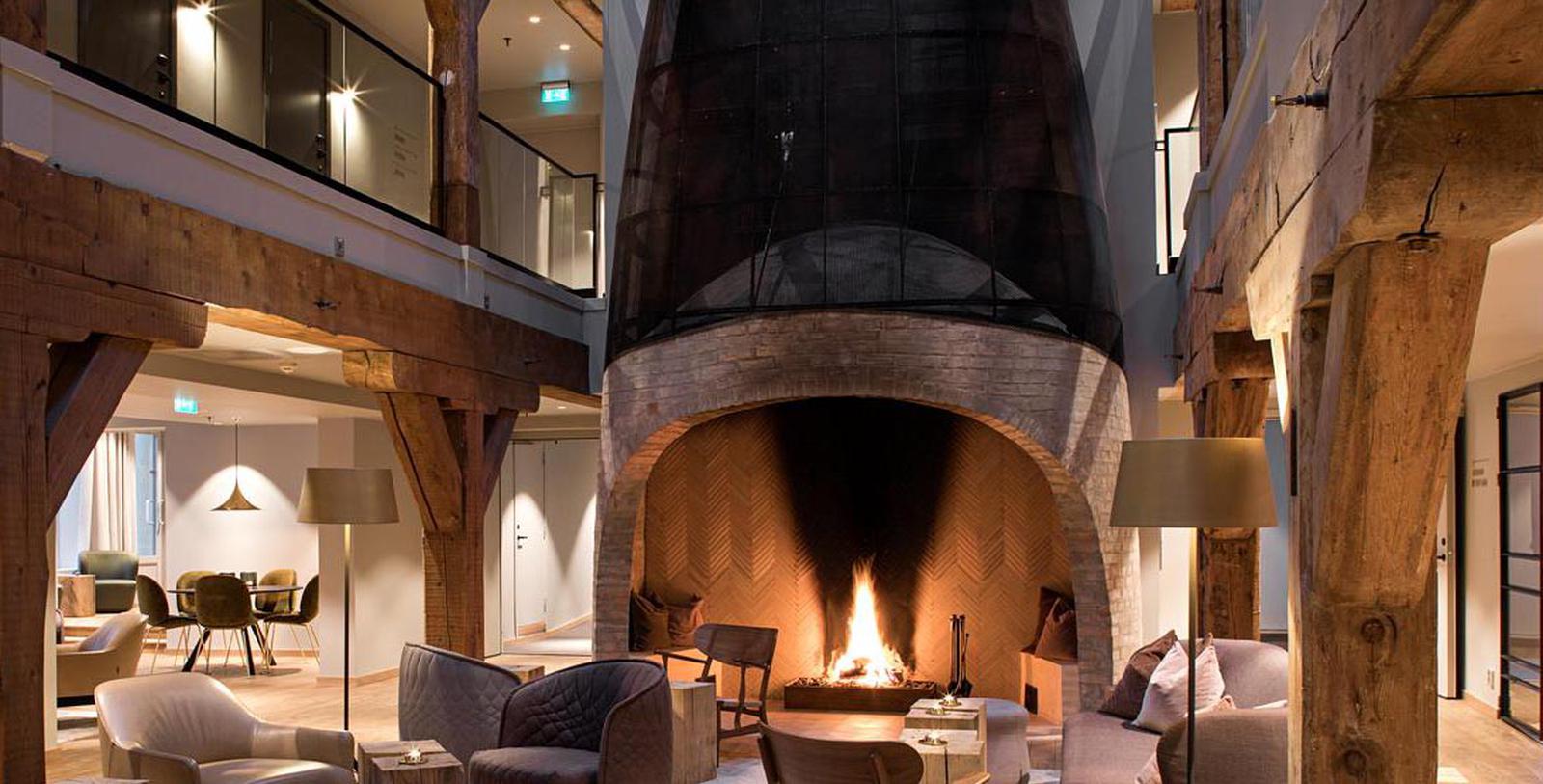 Image of Lobby Fireplace, Hotel Brosundet, Alesund, Norway, 1904, Member of Historic Hotels Worldwide, Experience