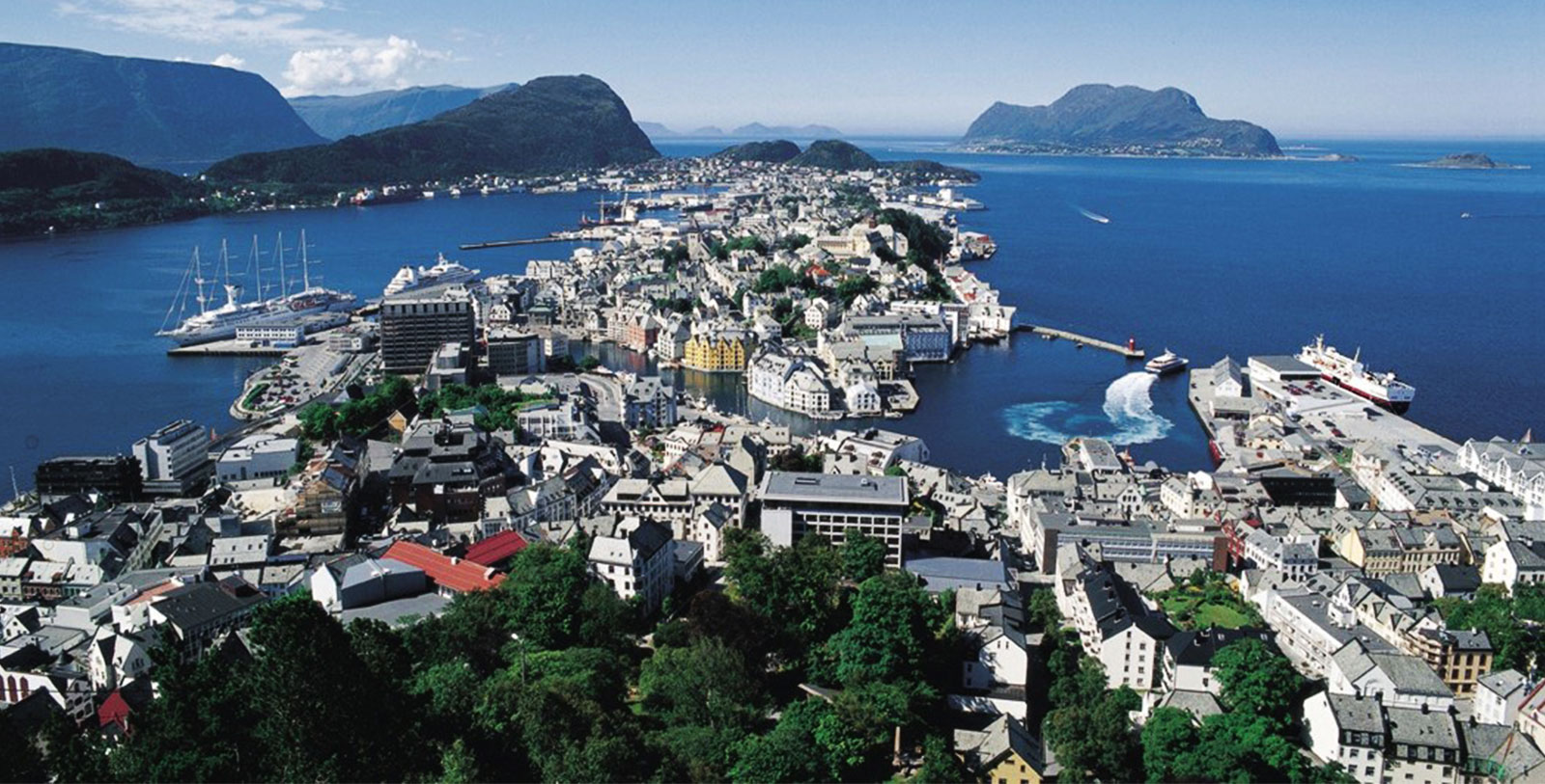 Explore the charming city of Ålesund and take in the views from atop Mount Aksla.