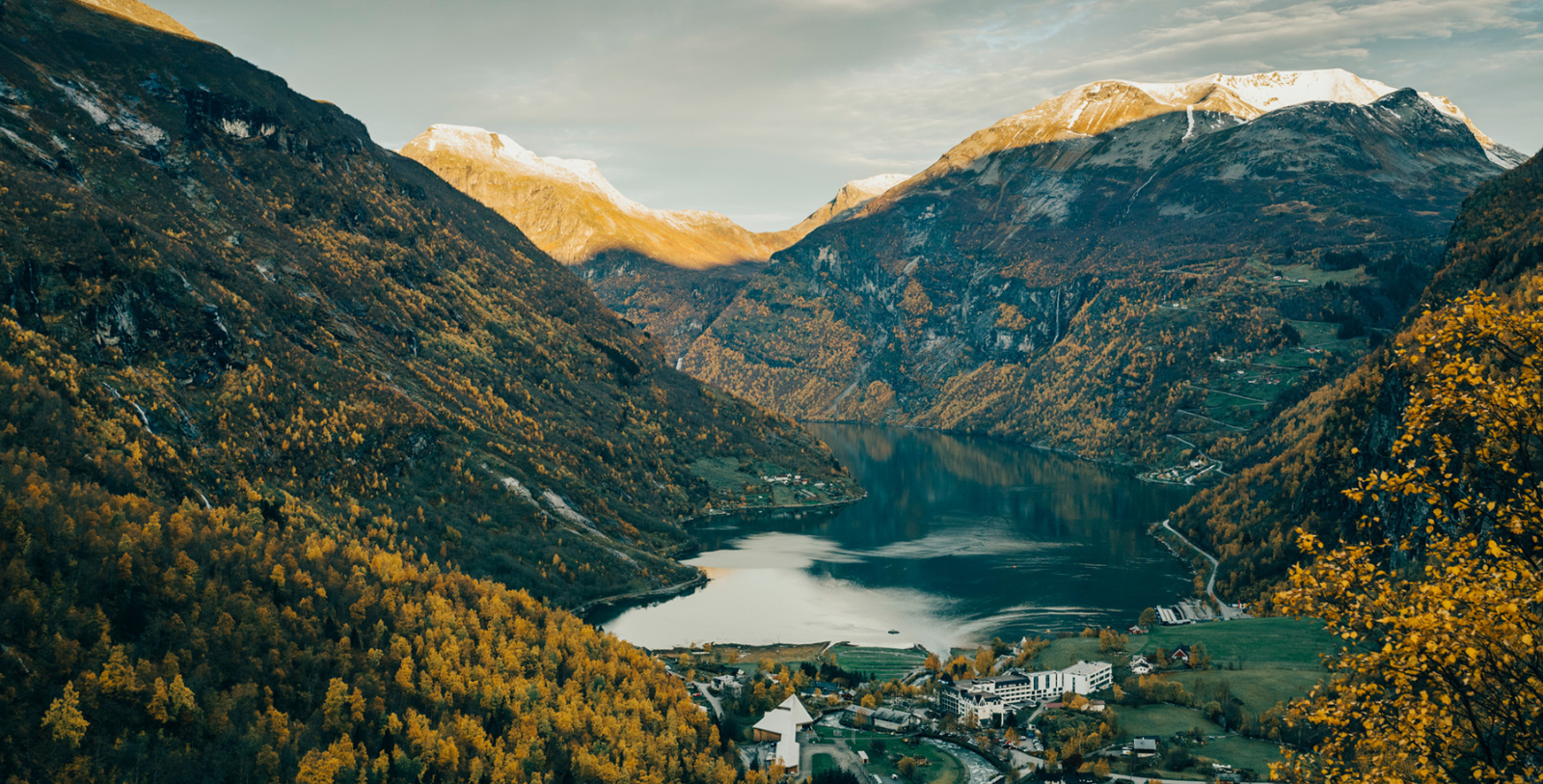 Uncover the wild beauty of the Geirangerfjord, a UNESCO World Heritage Site home to thundering waterfalls and towering cliffsides dotted by deserted fjord farms.