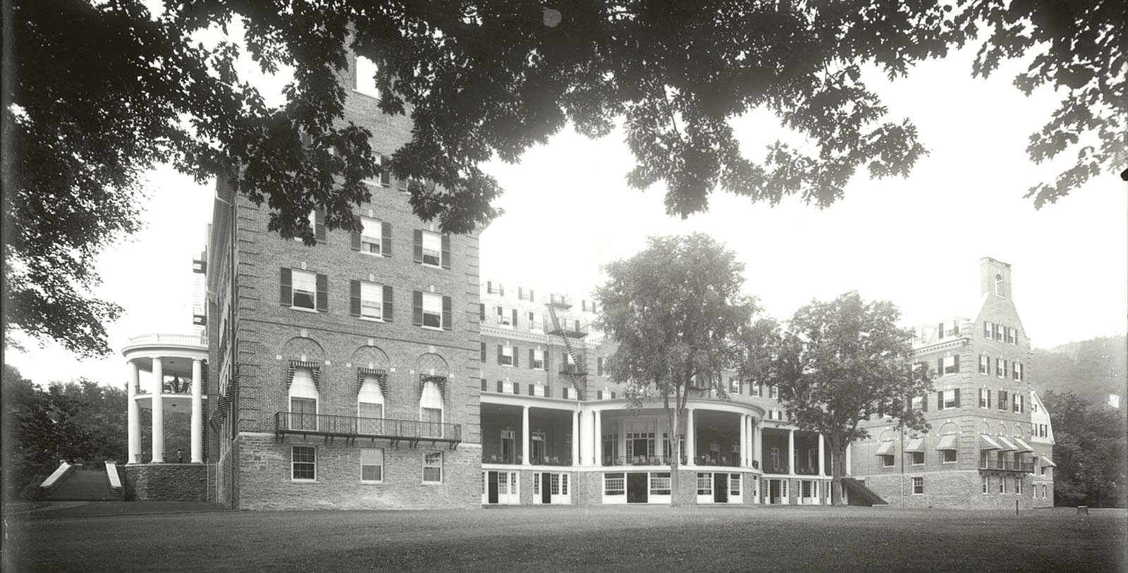 Historic Image of Hotel Front Entrance at The Otesaga Hotel and Cooper Inn, 1909, Member of Historic Hotels of America, in Cooperstown, New York, Discover
