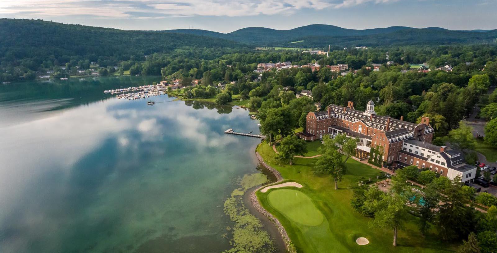 Image of Hotel Exterior The Otesaga Hotel and Cooper Inn, 1909, Member of Historic Hotels of America, in Cooperstown, New York, Special Offers, Discounted Rates, Families, Romantic Escape, Honeymoons, Anniversaries, Reunions