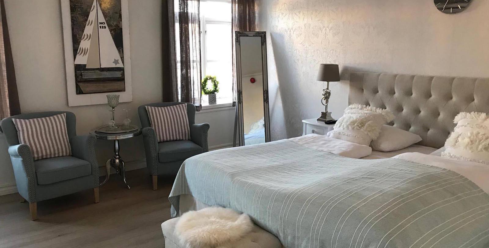 Image of guestroom Bekkjarvik Gjestgiveri, 1700s, Member of Historic Hotels Worldwide, in Norway, Explore
