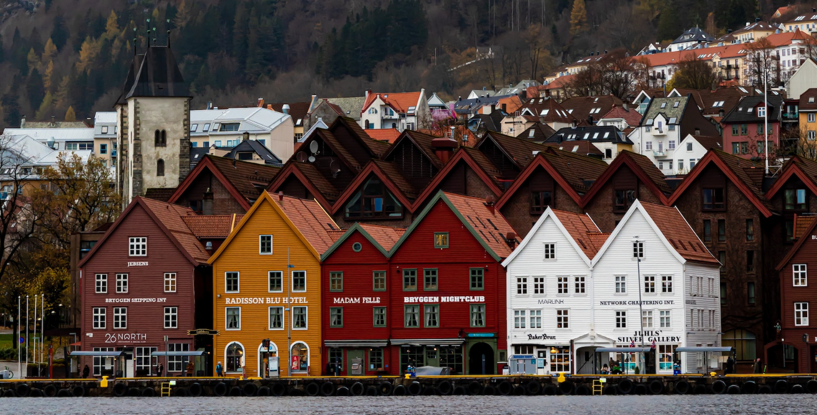 Explore the narrow alleyways and enjoy the harbor views of historic Bryggen, a centuries-old wharf and UNESCO World Heritage Site renowned for its Hanseatic trading heritage and colorful wooden houses straight out of a fairy tale.
