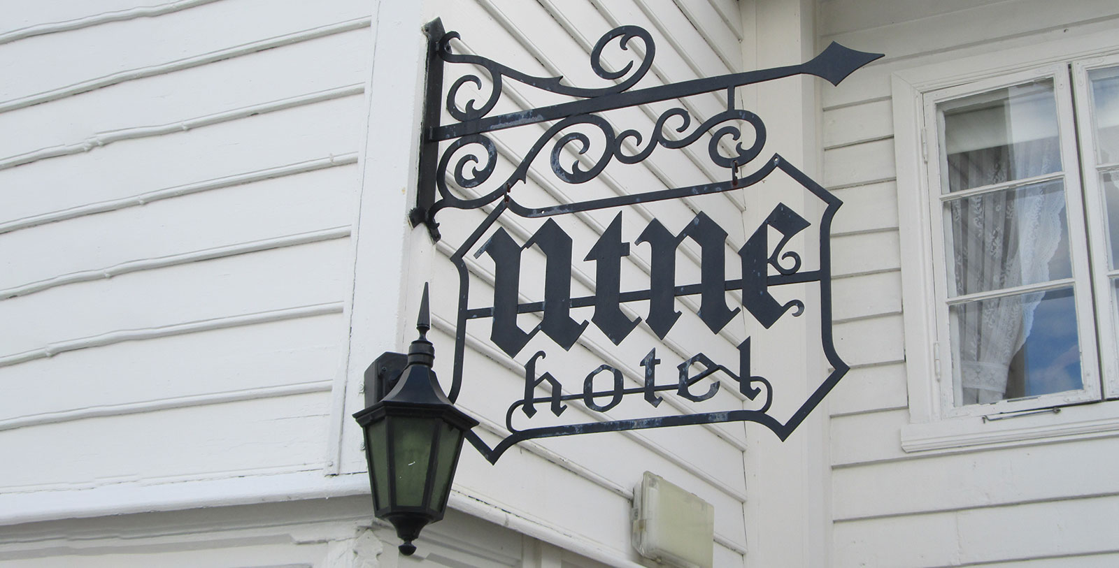 Image of Hotel Exterior Utne Hotel, 1722, Member of Historic Hotels Worldwide, in Utne, Norway, Special Offers, Discounted Rates, Families, Romantic Escape, Honeymoons, Anniversaries, Reunions