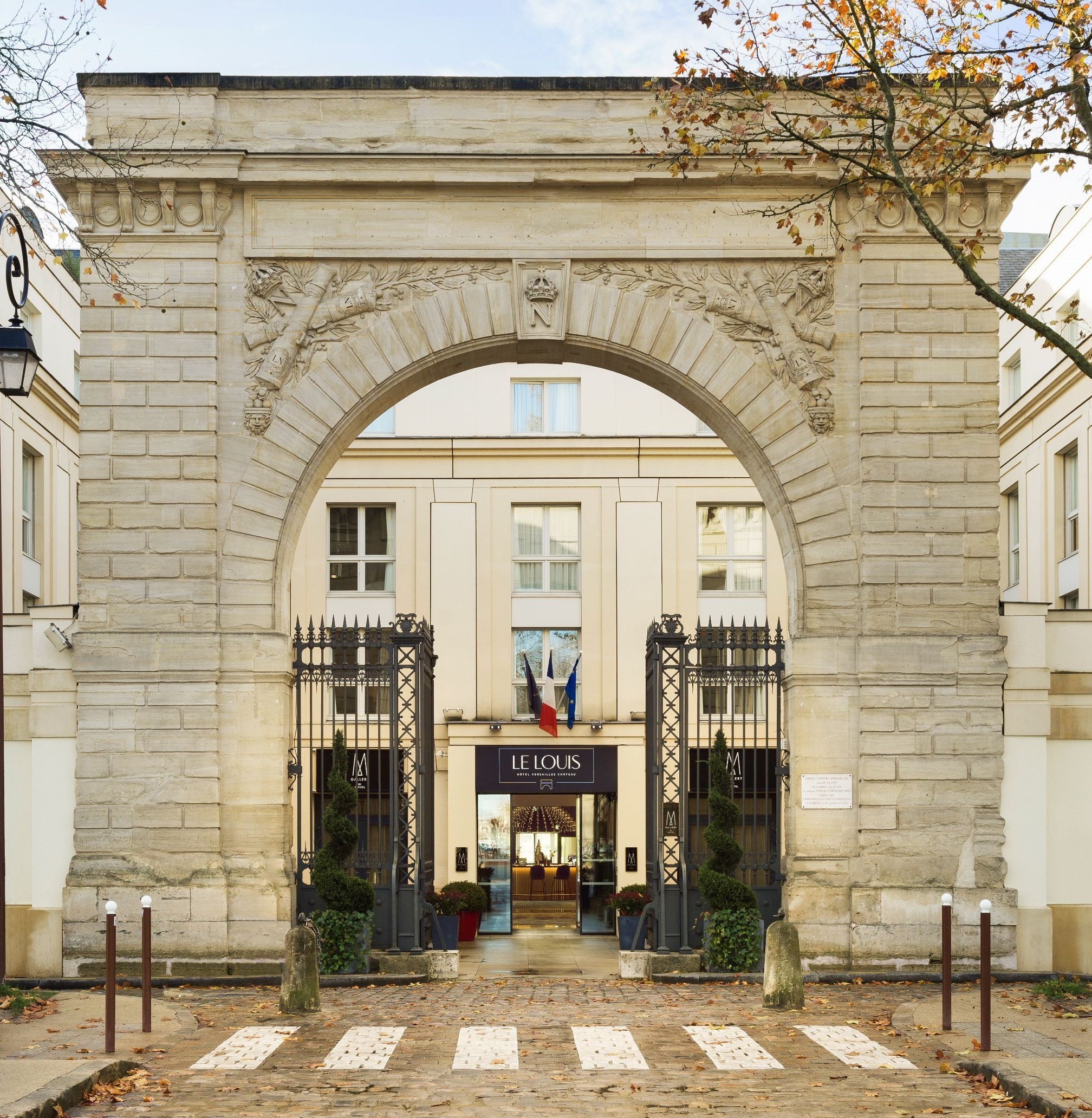 Image of Historical Arches, Hôtel Le Louis Versailles Château - MGallery By Sofitel, 1854, Member of Historic Hotels Worldwide, in Versailles, France.