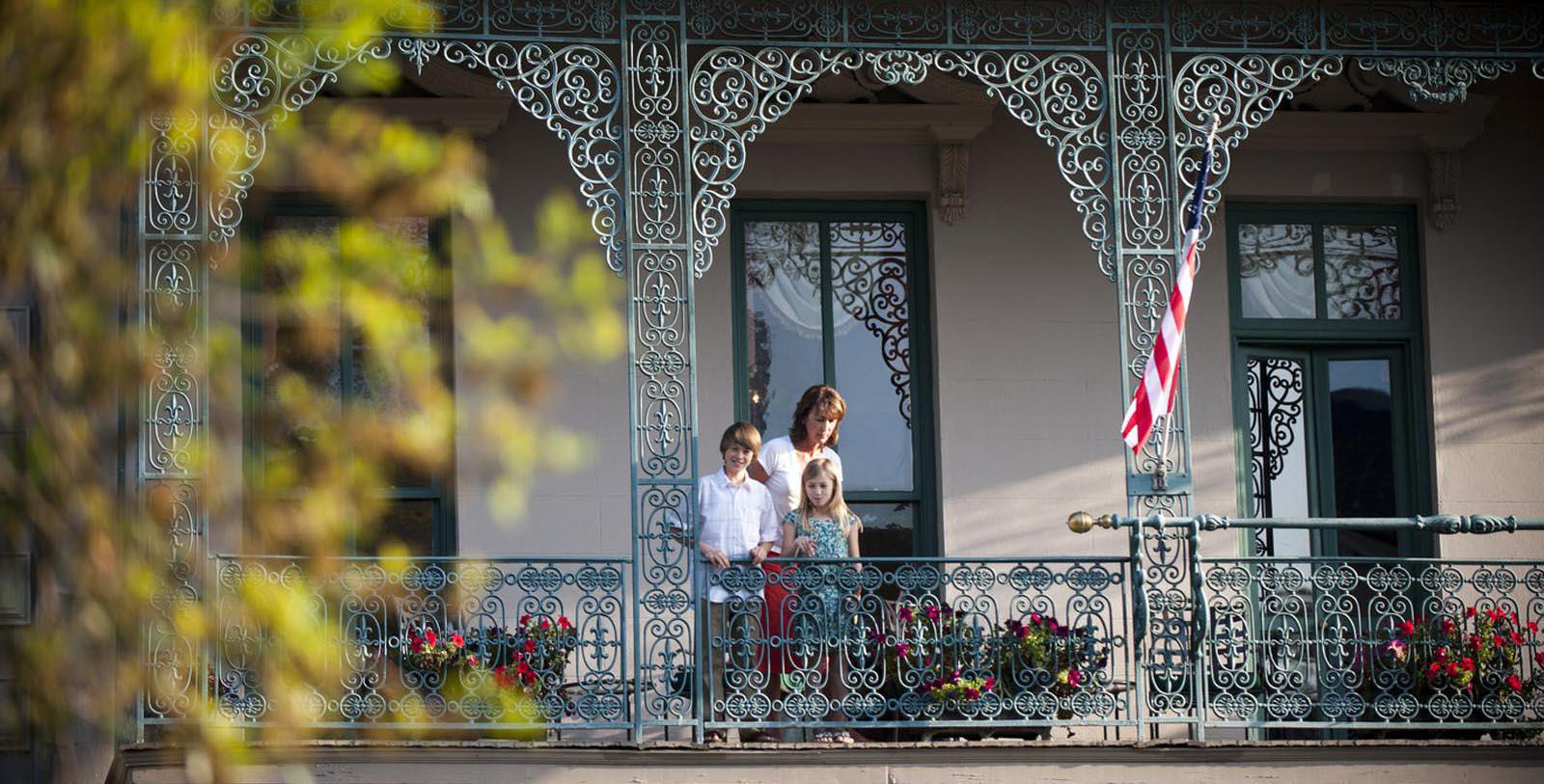 Image of Family on Balcony, John Rutledge House Inn in Charleston, South Carolina, 1763, Member of Historic Hotels of America, Explore