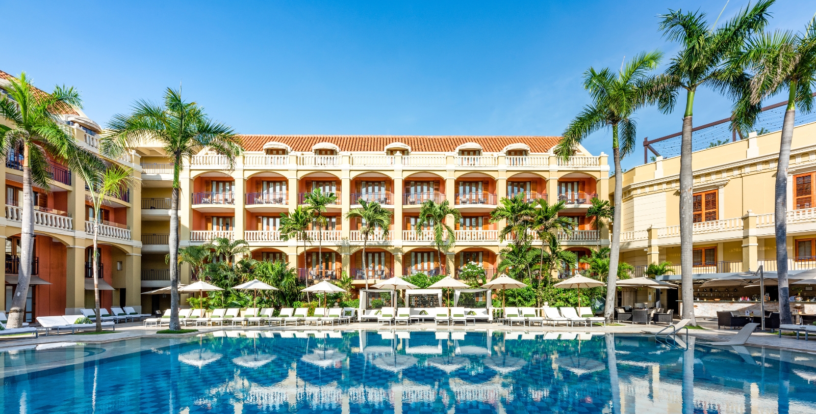 Experience the courtyard oasis and enjoy the Caribbean weather poolside.