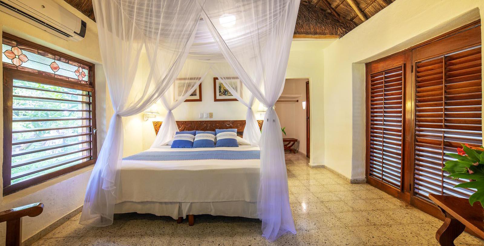 Image of Guestroom Interior Mayaland Hotel & Bungalows,1923, Member of Historic Hotels Worldwide, in Chichen Itza, Mexico, Location