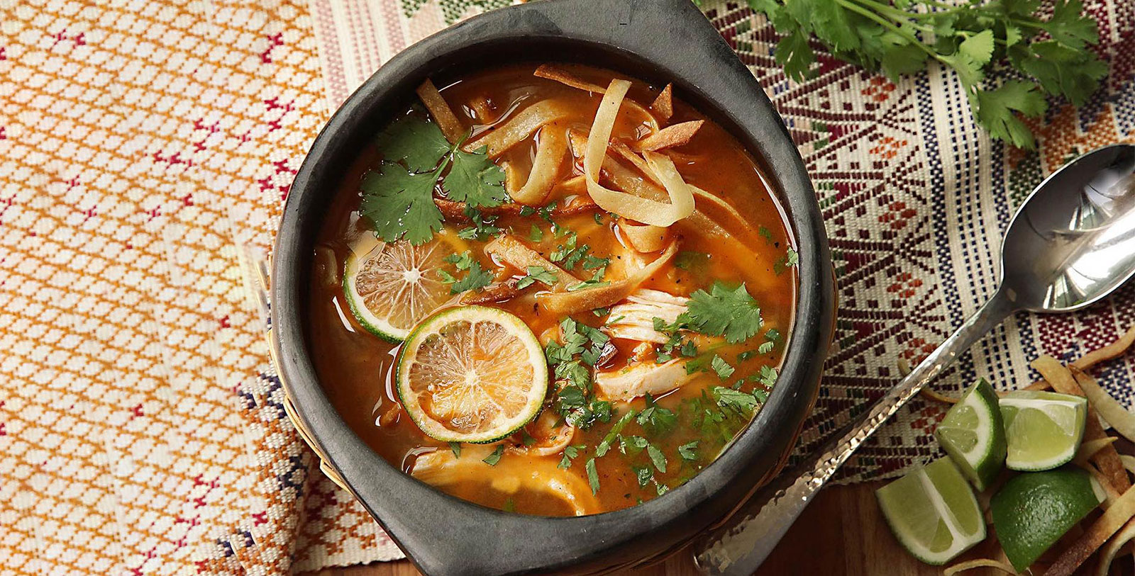 Taste Sopa de Lima, considered one of the most representative dishes of Yucatán.