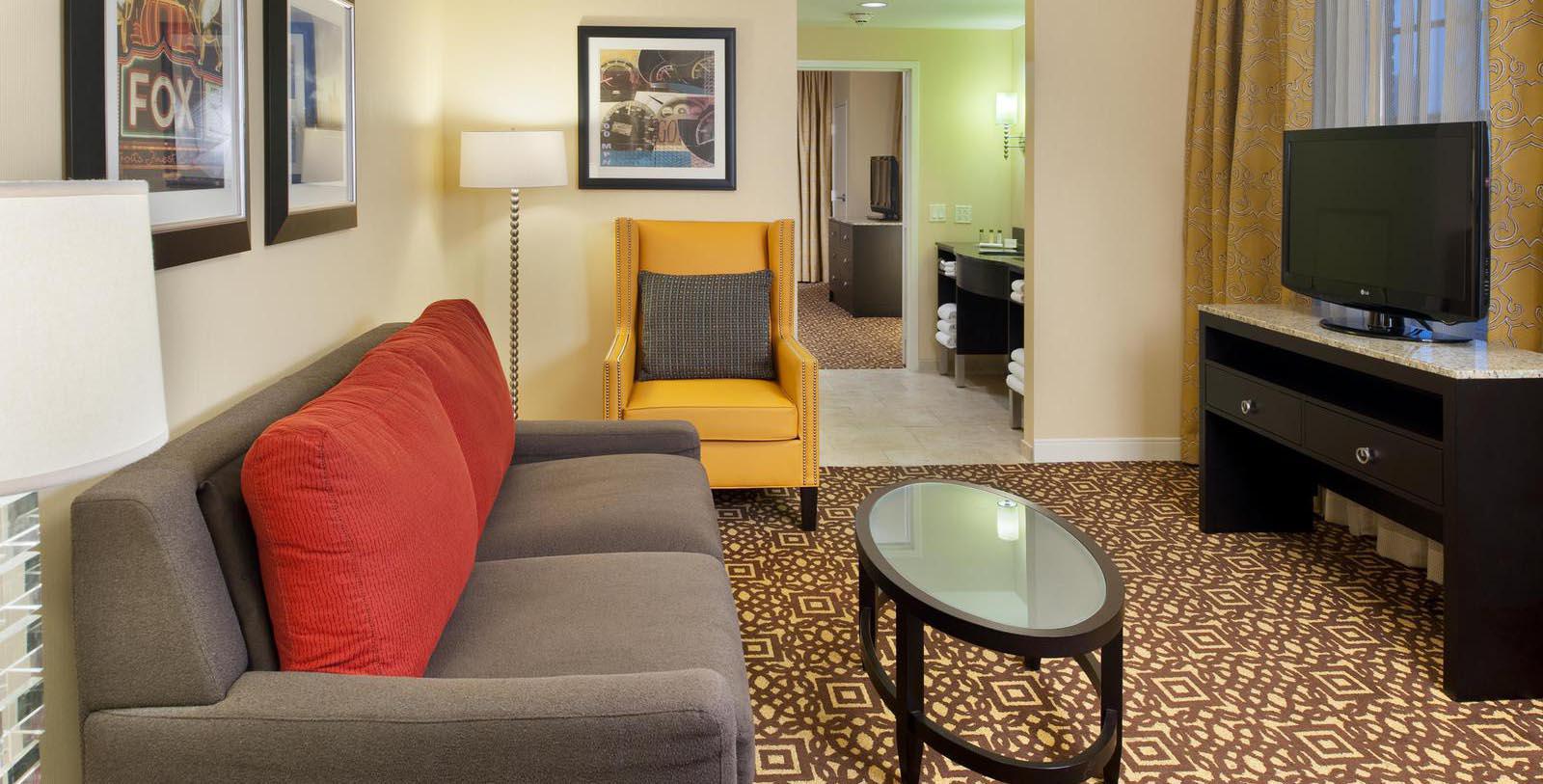 Image of Guestroom Suite seating area DoubleTree Suites by Hilton Hotel Detroit Downtown - Fort Shelby, 1917, Member of Historic Hotels of America, in Detroit, Michigan, Accommodations