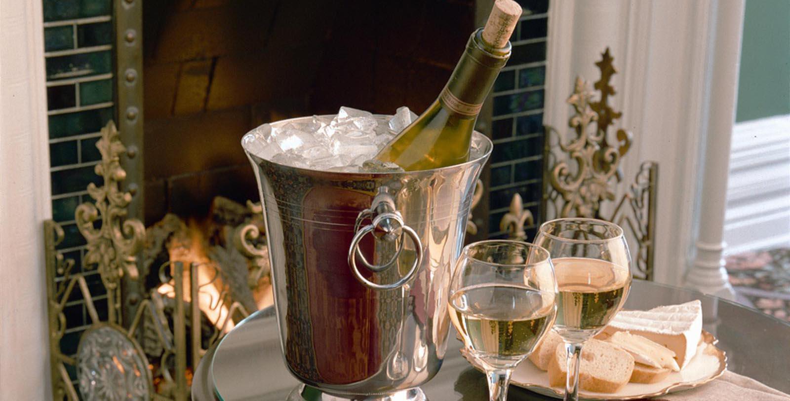 Image of Wine Bottle Chilling in Front of Fireplace The Inn on Ferry Street, 1886, Member of Historic Hotels of America, in Detroit, Michigan, Taste