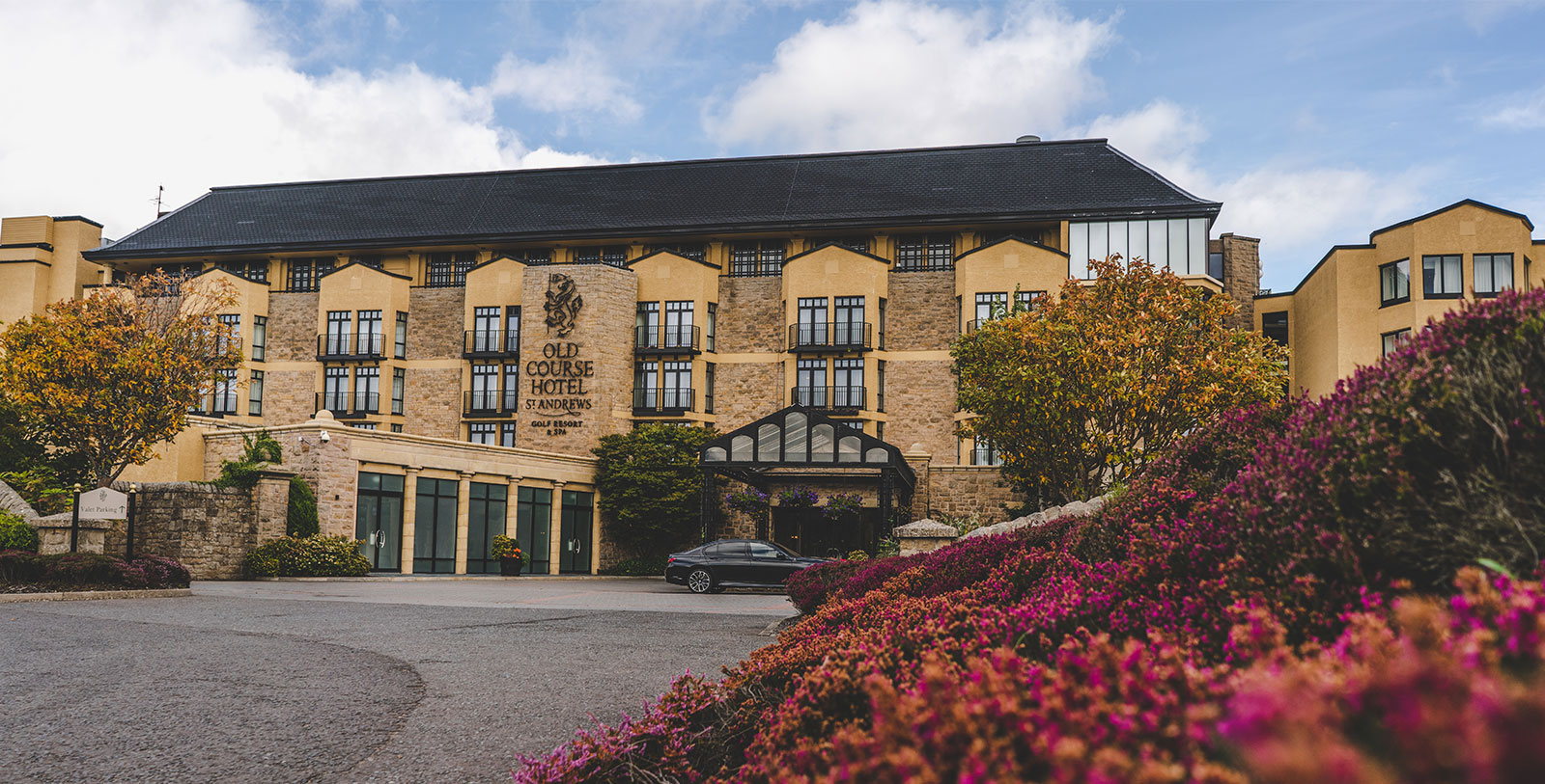 Image of Hotel Exterior at Old Course Hotel, Golf Resort & Spa, 15th Century, Member of Historic Hotels Worldwide, in St. Andrews, Scotland, Special Offers, Discounted Rates, Families, Romantic Escape, Honeymoons, Anniversaries, Reunions