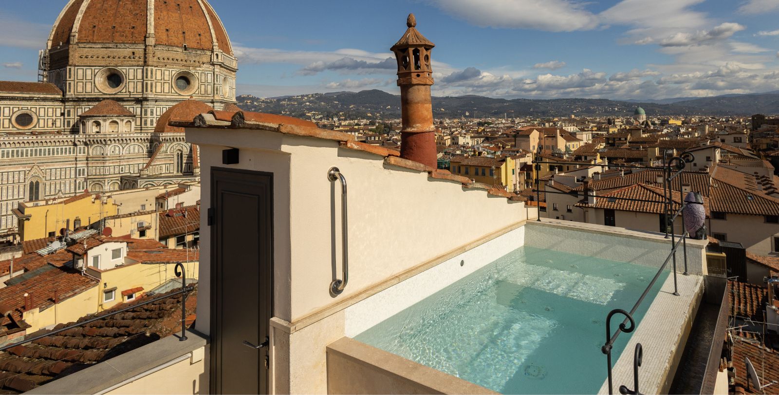 Experience a private, elevated stay shaped by personalized services and rooftop views.