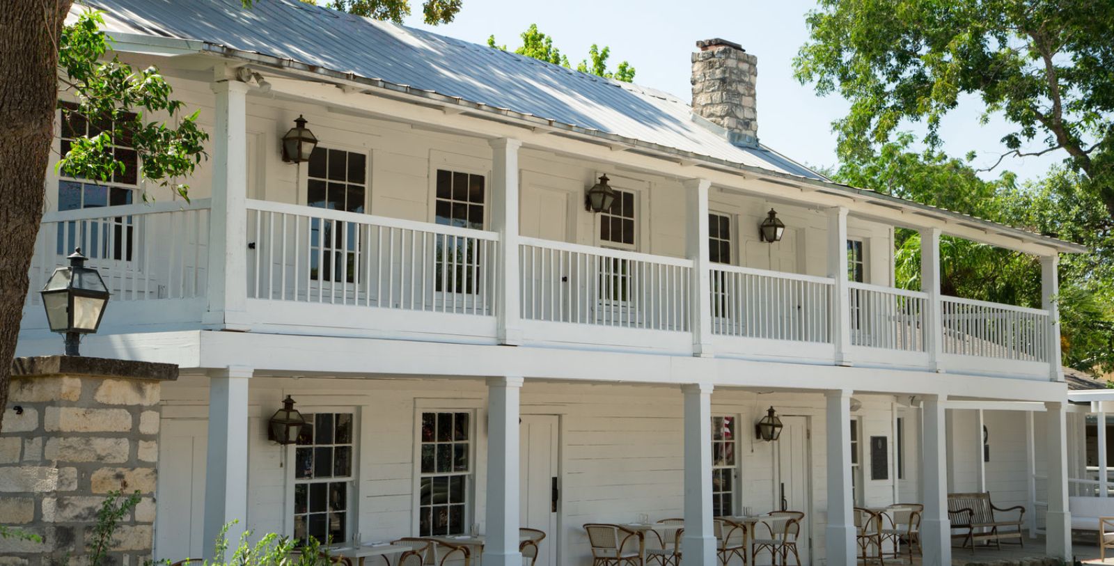 Image of Hotel Front Entrance and Hotel Sign at The Stagecoach Inn, 1852, Member of Historic Hotels of America, in Salado, Texas, Overview