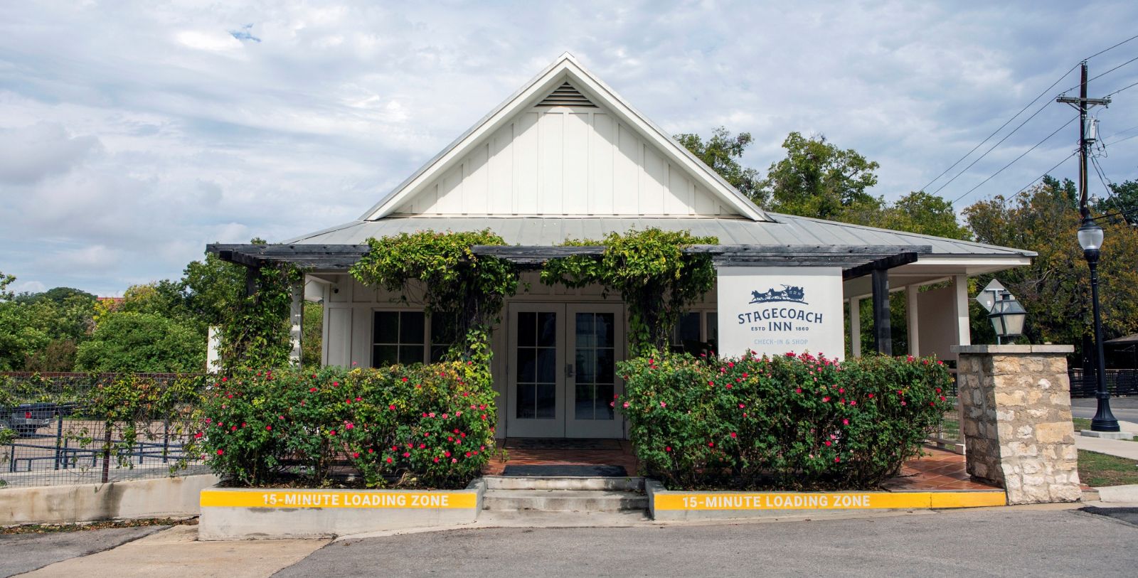 Image of Hotel Front Entrance and Hotel Sign at The Stagecoach Inn, 1852, Member of Historic Hotels of America, in Salado, Texas, Overview