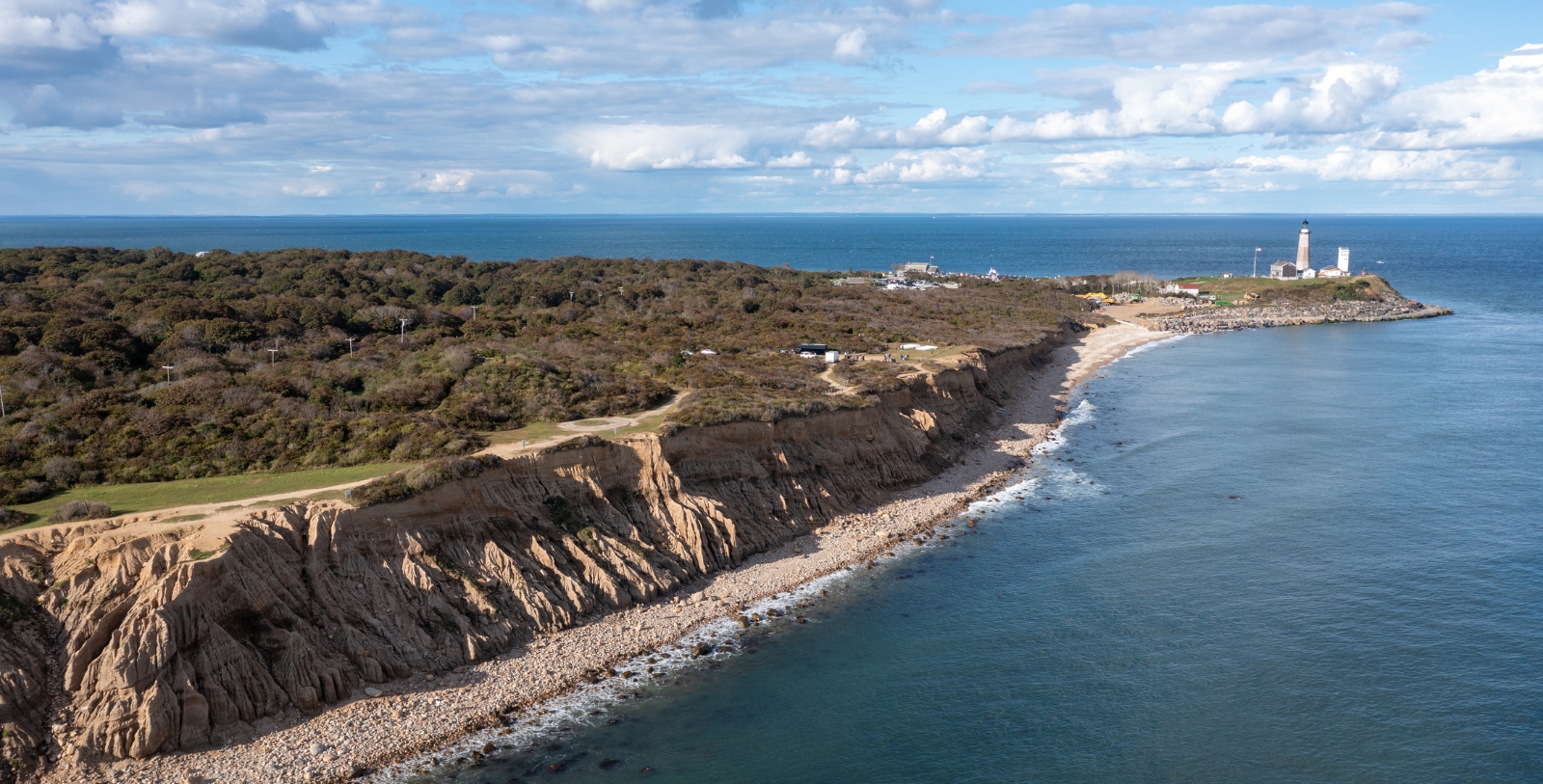 Experience the picturesque cliffsides, lighthouses, and bustling coastal main streets on Long Island.