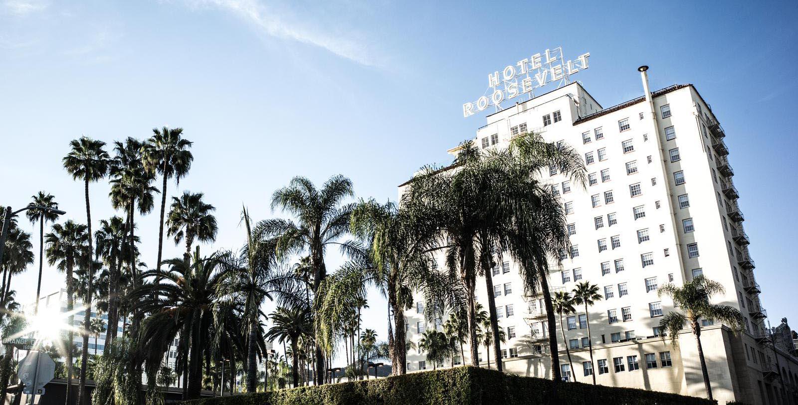 Image of Hotel Exterior with Palm Trees The Hollywood Roosevelt, 1927, Member of Historic Hotels of America, in Hollywood, California, Special Offers, Discounted Rates, Families, Romantic Escape, Honeymoons, Anniversaries, Reunions