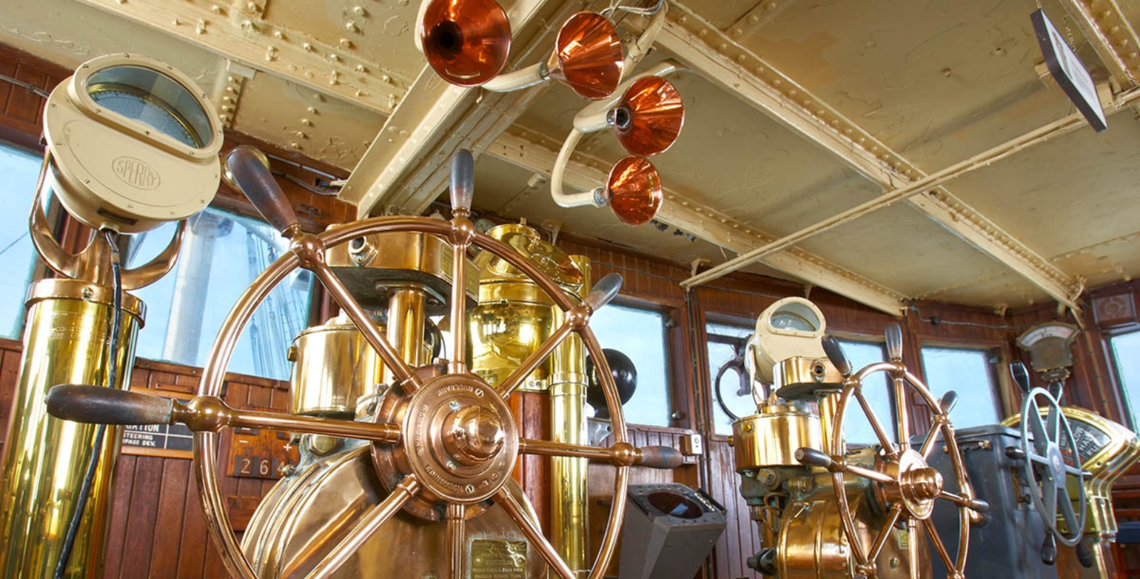 Discover harbor views from The Queen Mary's Sun Deck, with comfortable seating and access to the bridge and radio room.