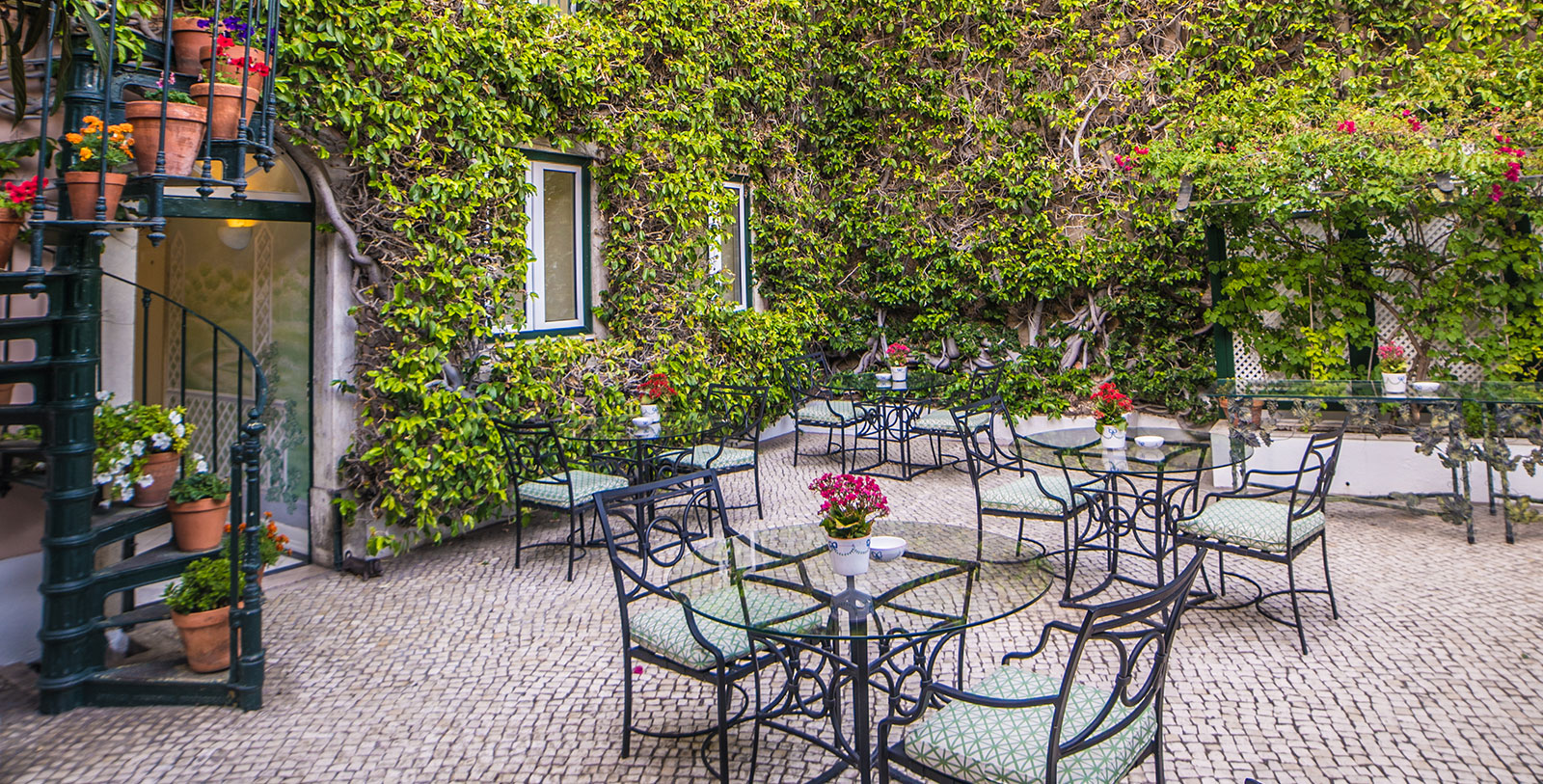 Image of the garden courtyard at As Janelas Verdes, 18th century, a member of Historic Hotels Worldwide in Lisbon, Portugal