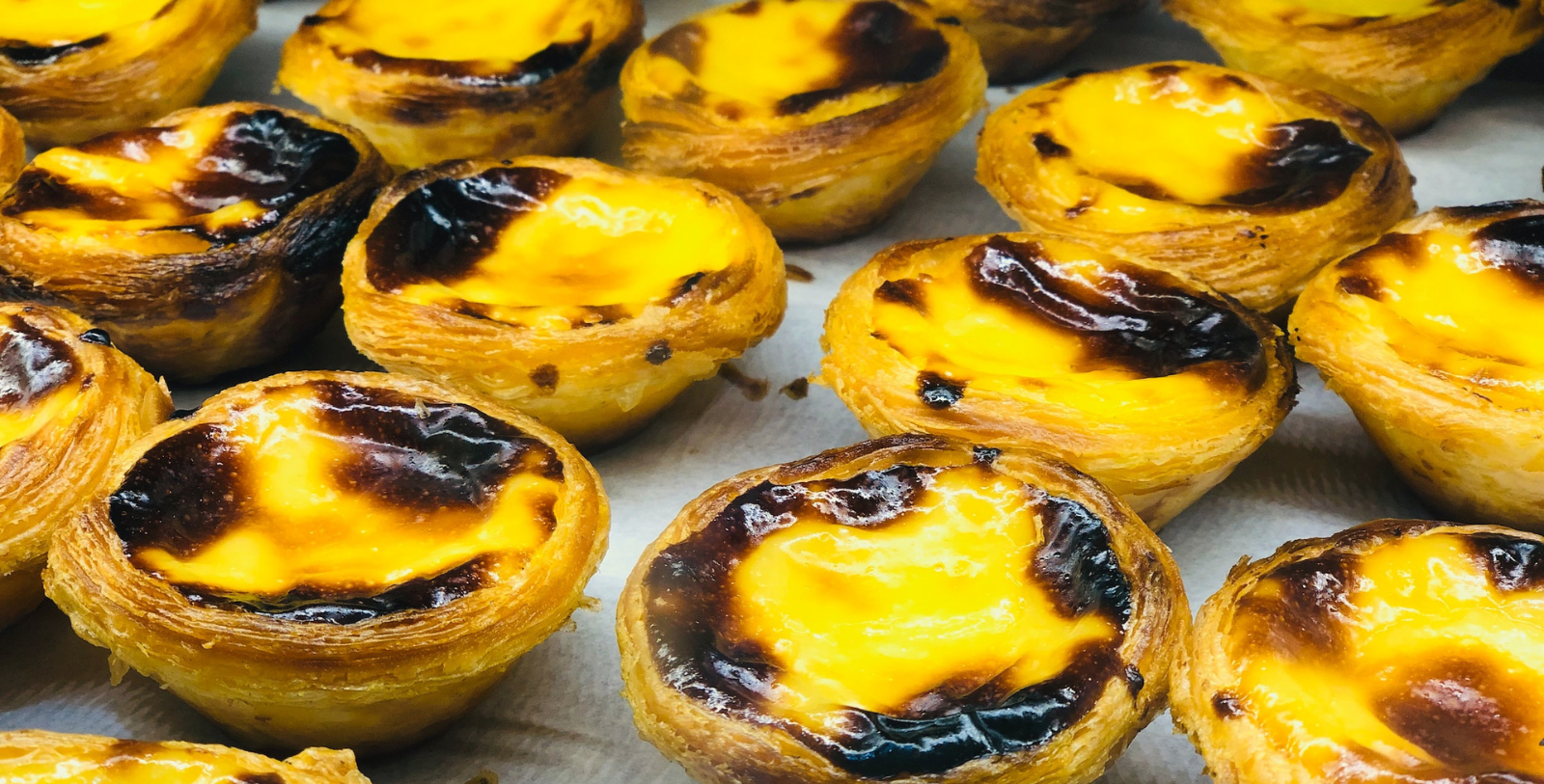Taste Lisbon’s delicious culinary traditions, from ocean-fresh seafood like tinned conservas and bacalhau, a meal of salted cod considered the city’s unofficial dish, to pastéis de nata, a sweet, custard-filled egg tart.
