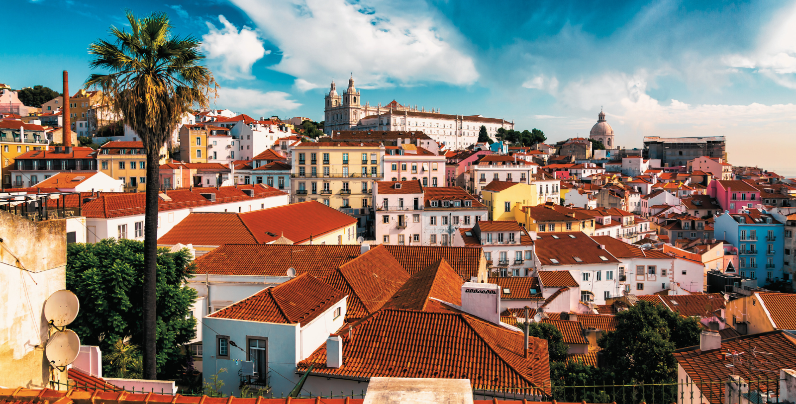 Explore the charming maze of narrow, hilly, meandering cobblestone streets in Alfama, a historic district known for its postcard-ready cityscape of brick-red rooflines and Tagus River views and home to Santa Apolónia Station.