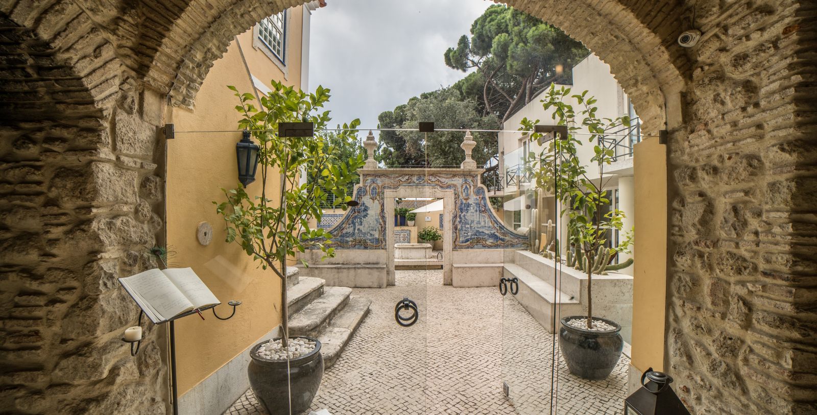 Image of the exterior and courtyard at Solar do Castelo, 1765, a member of Historic Hotels Worldwide in Lisbon, Portugal