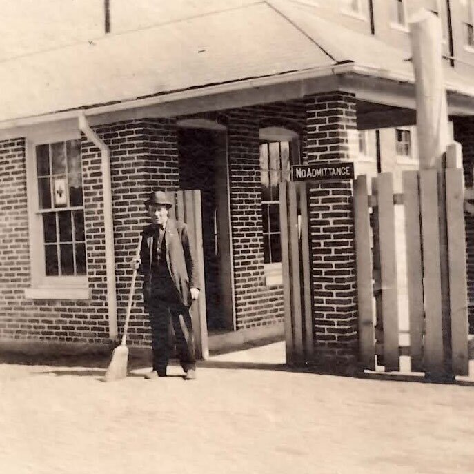 Historical Image of Factory Worker with Broom, Cork Factory Hotel, 1865, Member of Historic Hotels of America, in Lancaster, Pennsylvania.