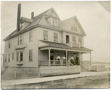 Historical Image of Hotel Iroquois featuring the Benjamin Family, the original owners of the hotel.