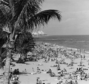 Historical image of sun bathers at Miami Beach, Florida, in 1948 in the wake of World War II.
