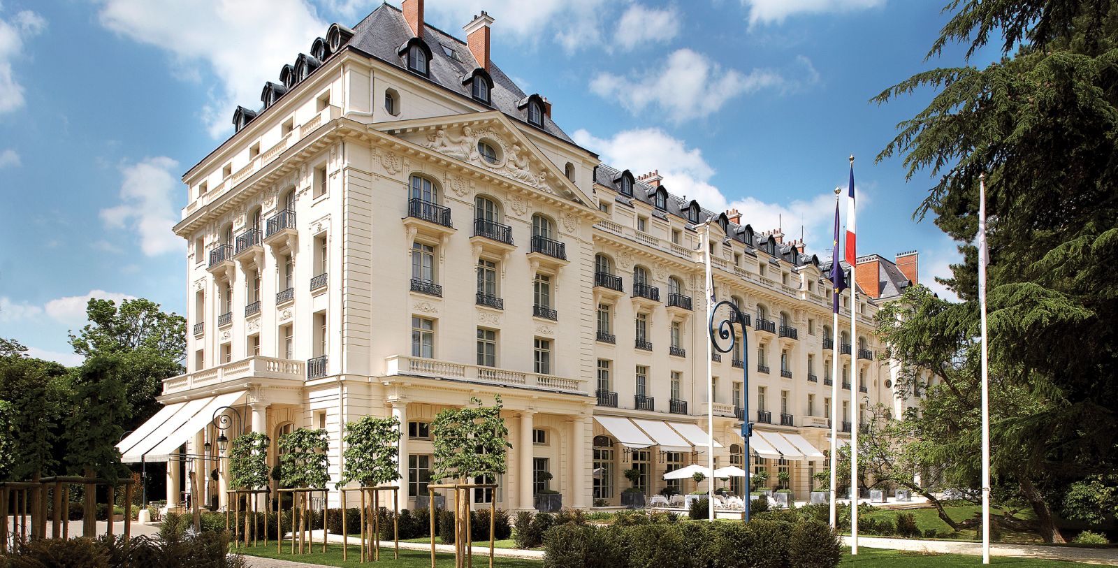 Image of hotel exterior at Waldorf Astoria Versailles- Trianon Palace, 1910, a Member of Historic Hotels Worldwide in Versailles, France.