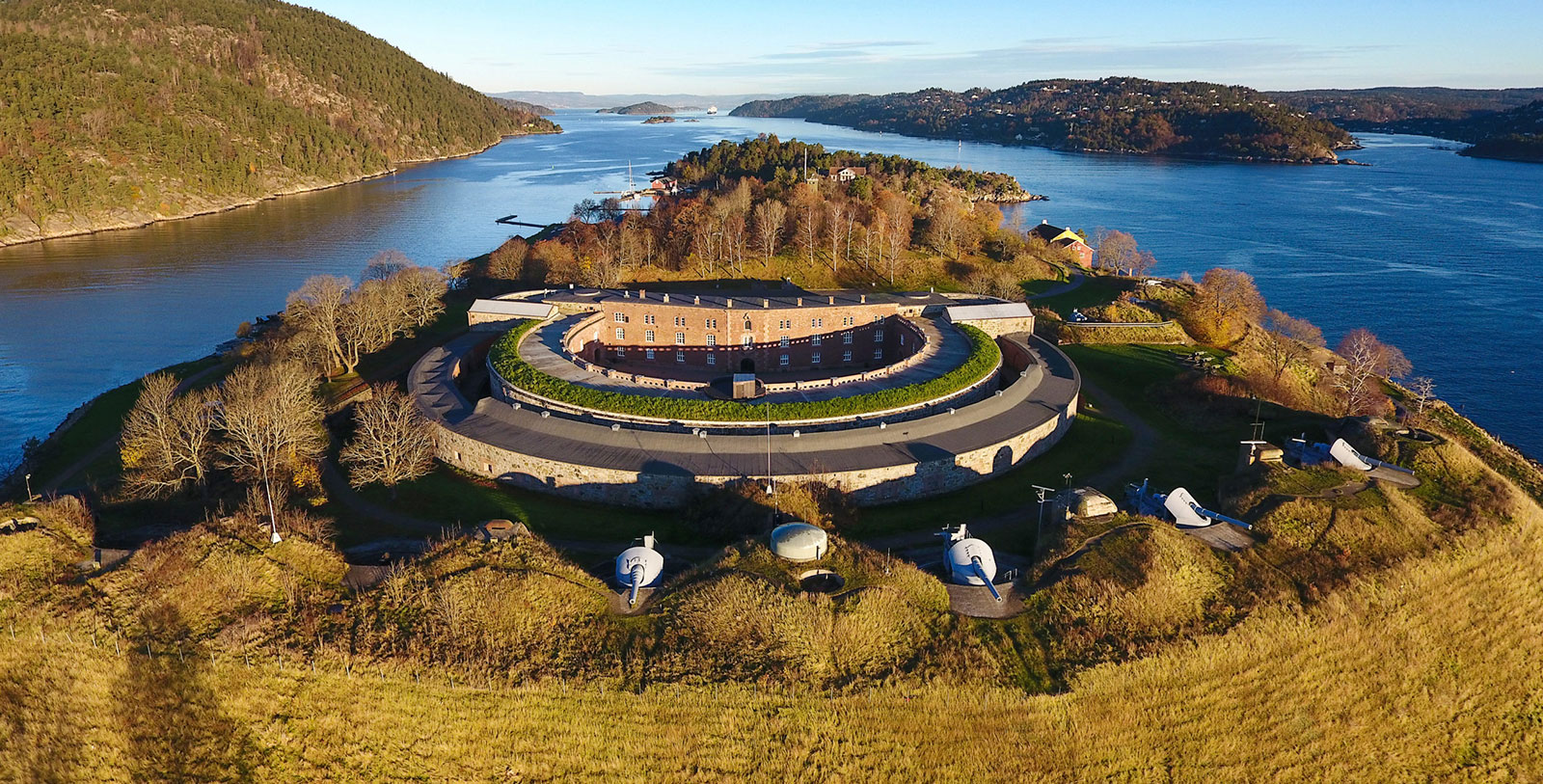 Explore the Akerhus Fortress (Akerhus Festning) along the shoreline of Oslo harbor.