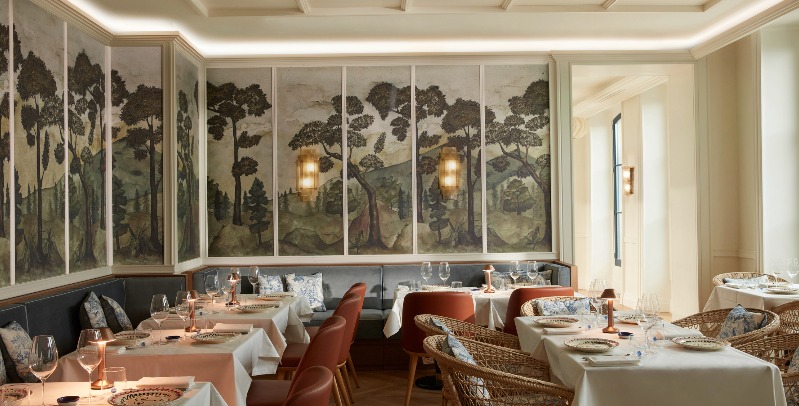 Image of indoor dining area of La Chambre Bleue at Maison Delano Paris, a member of Historic Hotels Worldwide since 2023, located in Paris, France