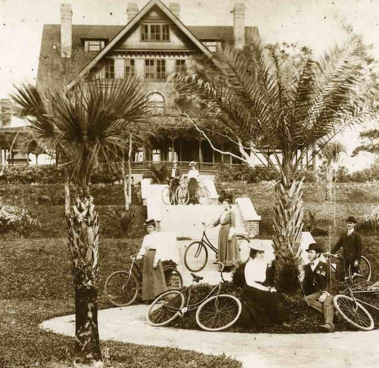 Historical Image of Exterior with Bicyclists, Belleview Inn, 1897, Member of Historic Hotels of America, in Belleair, Florida.