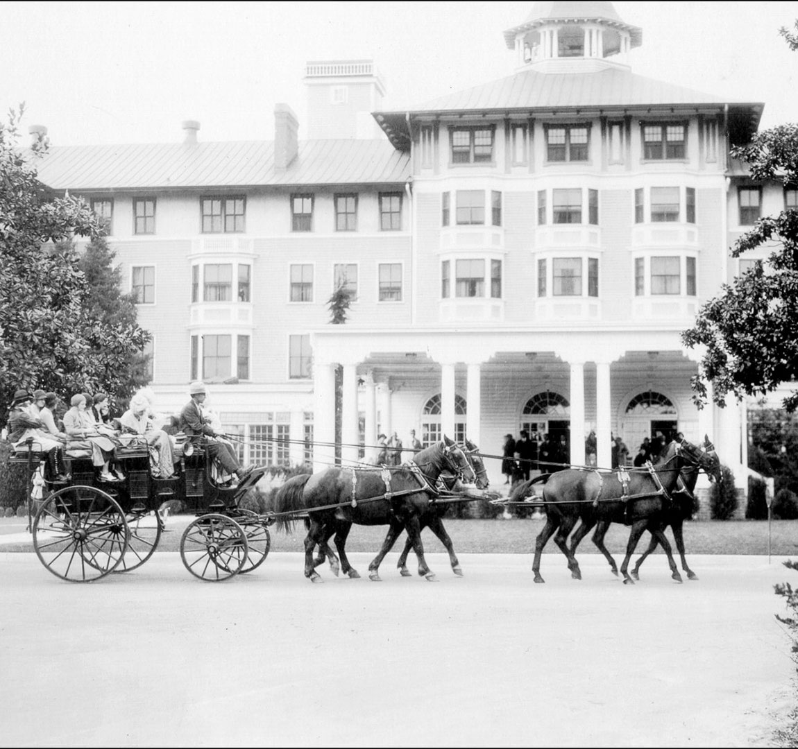 Historical Image of Horse-Drawn Carriage Passing by The Carolina Hotel, Pinehurst Resort, 1895, Historic Hotels of America, in Pinehurst, North Carolina.