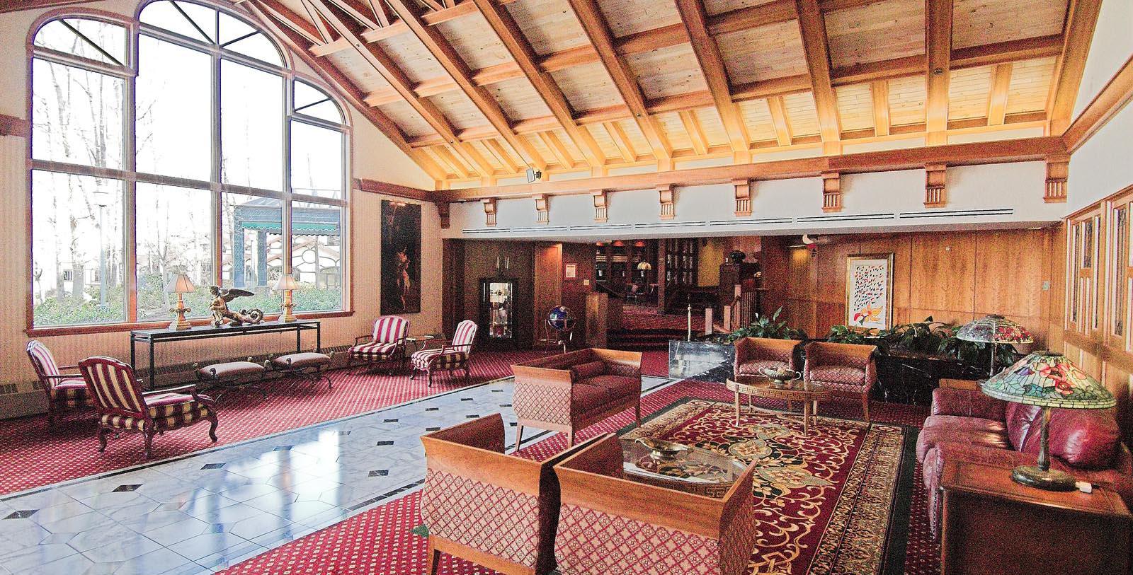 Image of Hotel Exterior The Lodge at Nemacolin Woodlands Resort, 1968, Member of Historic Hotels of America, in Farmington, Pennsylvania, Masthead 1