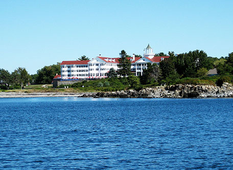 Image of Hotel Exterior with Beach The Colony Hotel, 1914, Member of Historic Hotels of America, in Kennebunkport, Maine, Special Offers, Discounted Rates, Families, Romantic Escape, Honeymoons, Anniversaries, Reunions