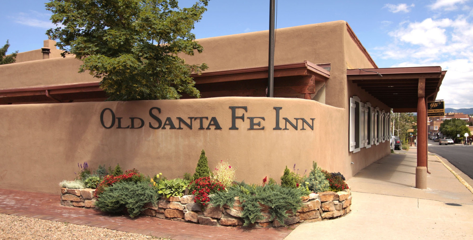 Image of Exterior, Old Santa Fe Inn, 1930s, Member of Historic Hotels of America, in Santa Fe, New Mexico, History