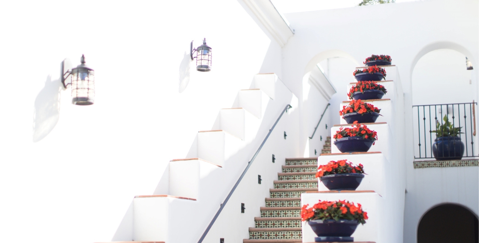 Discover the Spanish Colonial-style façade of the Omni La Costa Resort.