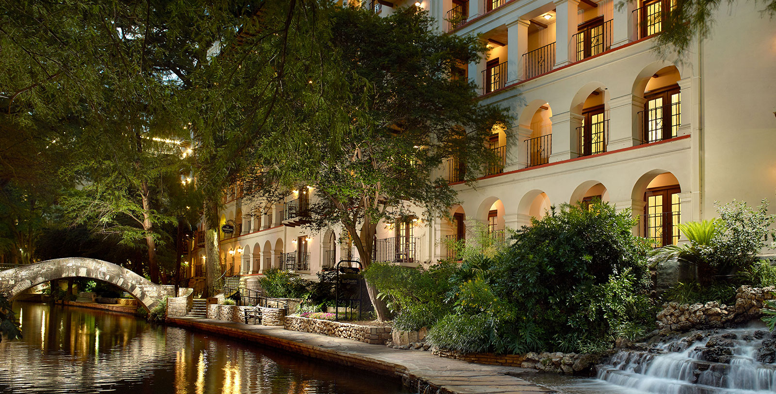 Image of Hotel Exterior & Riverwalk at Night, Omni La Mansion del Rio, San Antonio, Texas, 1852, Member of Historic Hotels of America, Overview