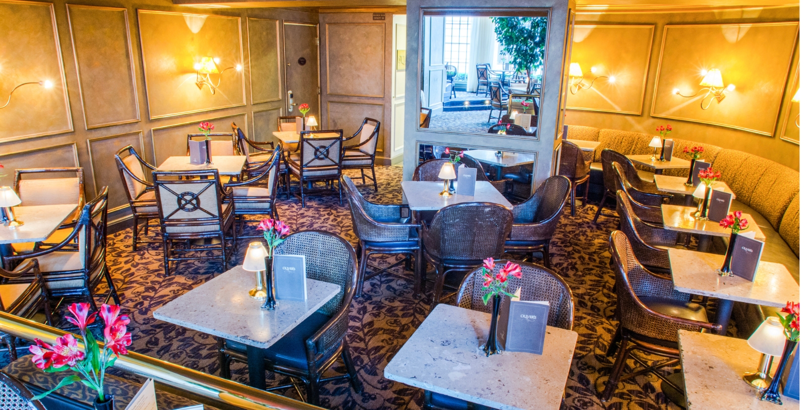 Taste a classic martini, the signature drink at Oliver’s Lounge.