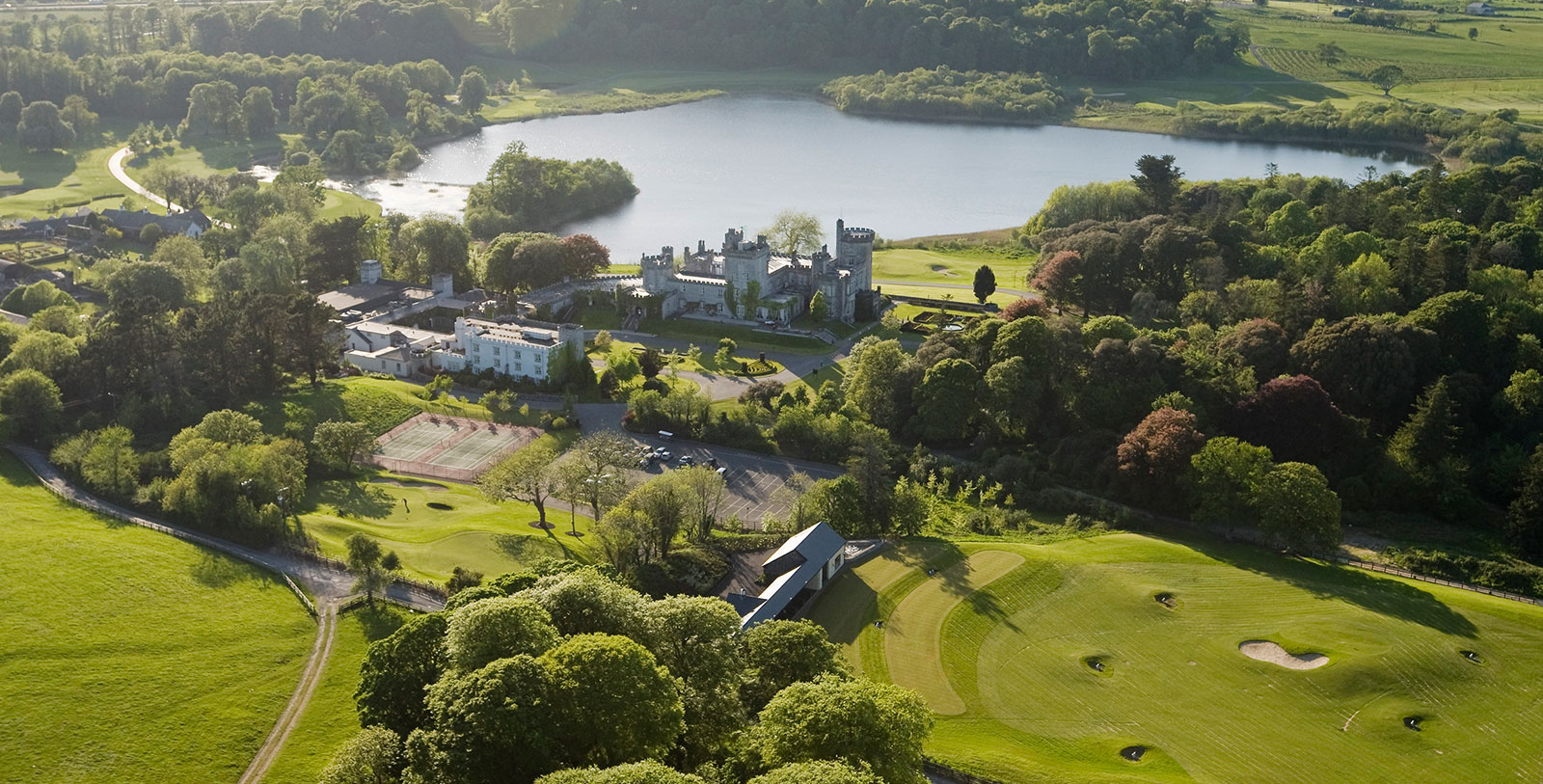 Historical Image of Exterior and Golf Course Aerial View, Dromoland Castle Hotel, 1014, Member of Historic Hotels Worldwide, in County Clare, Ireland, Golf