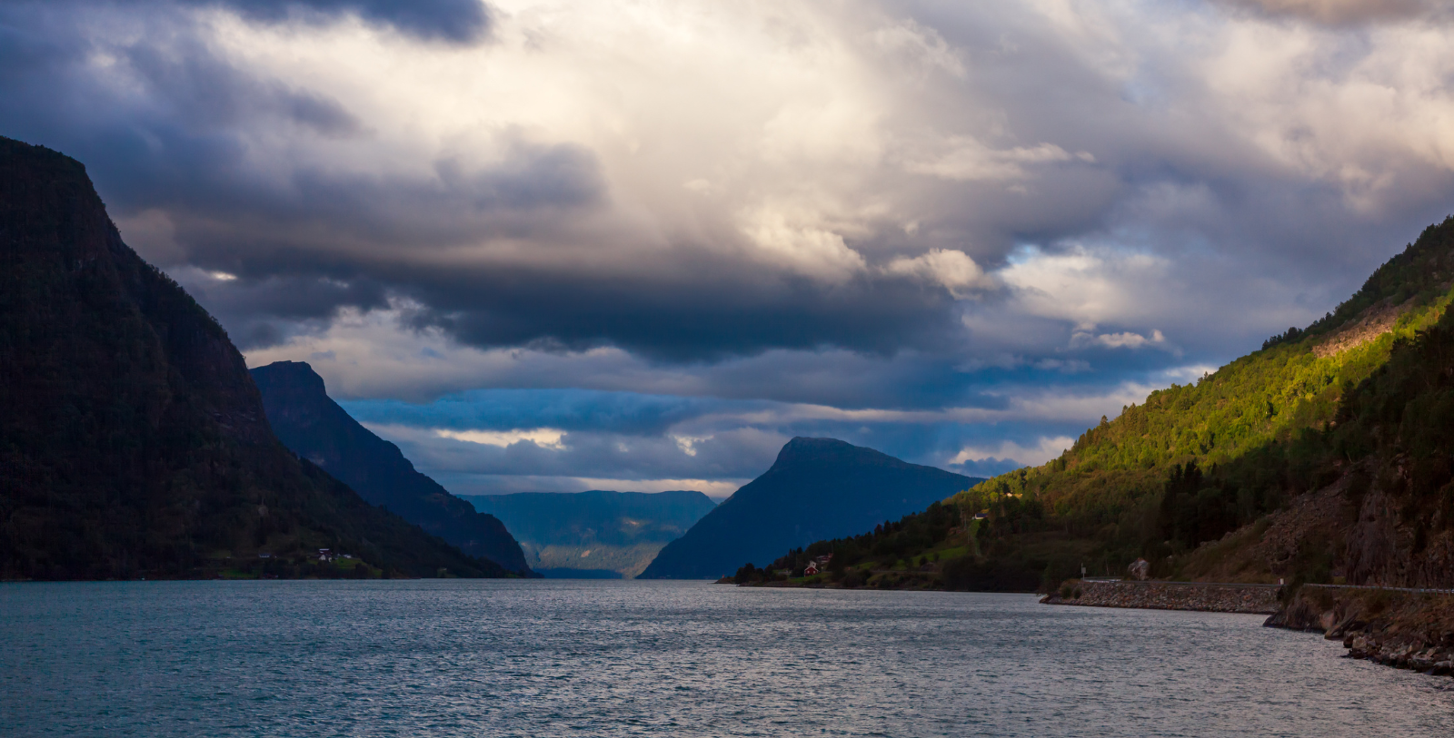 Image of Lustrafjord from the water near Walaker Hotell, 1640, Member of Historic Hotels Worldwide since 2023, in Solvorn, Norway