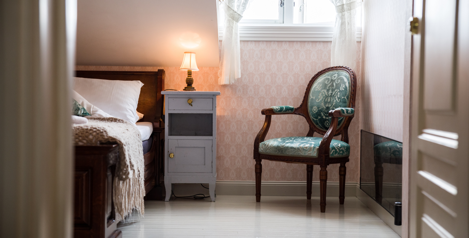Image of guestroom at Walaker Hotell, 1640, Member of Historic Hotels Worldwide since 2023, in Solvorn, Norway