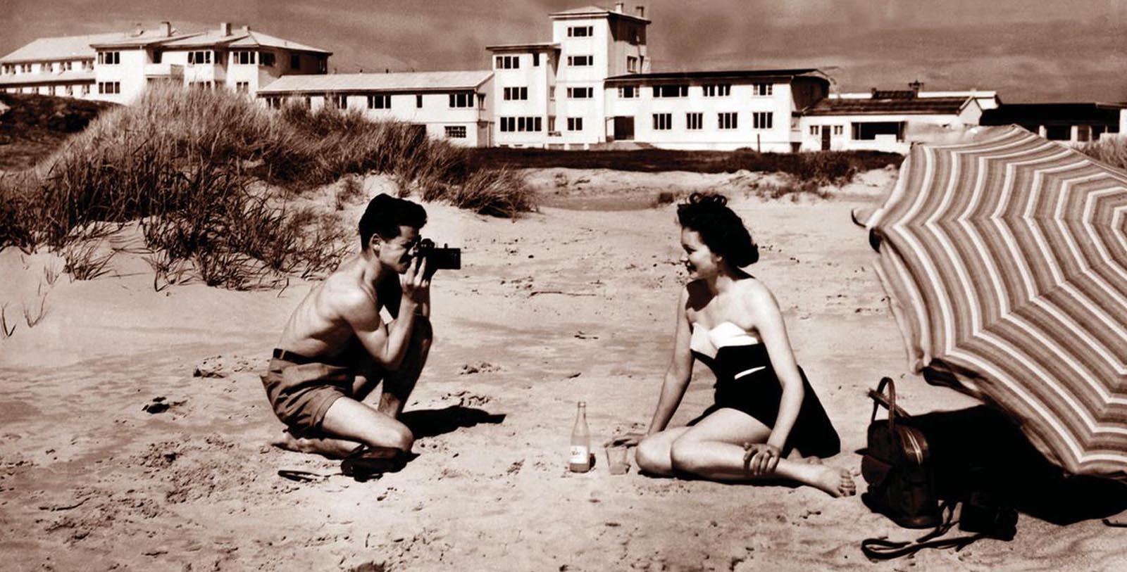 Historic Image of Two Guests on Beach at Sola Strand Hotel, 1914, Member of Historic Hotels Worldwide, in Sola, Norway, Discover