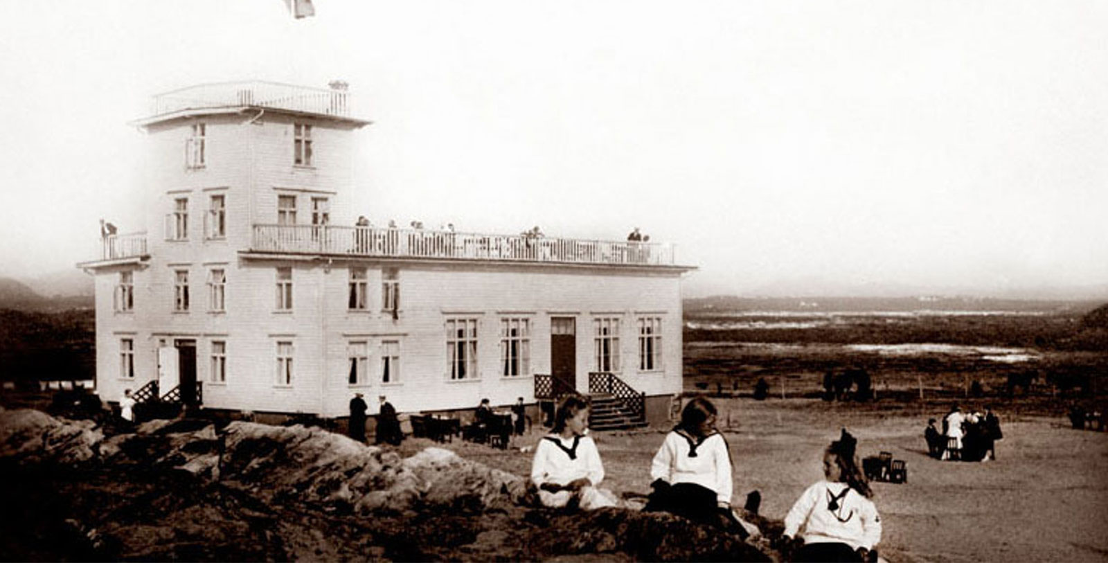 Historic Image of Two Guests on Beach at Sola Strand Hotel, 1914, Member of Historic Hotels Worldwide, in Sola, Norway, Discover