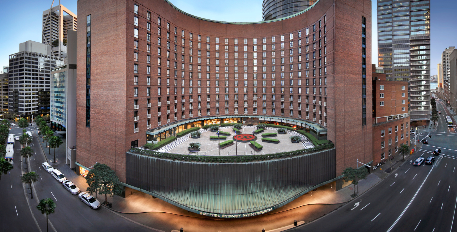 Discover the serene courtyard garden, an oasis of calm sheltered by the hotel's signature curved exterior.