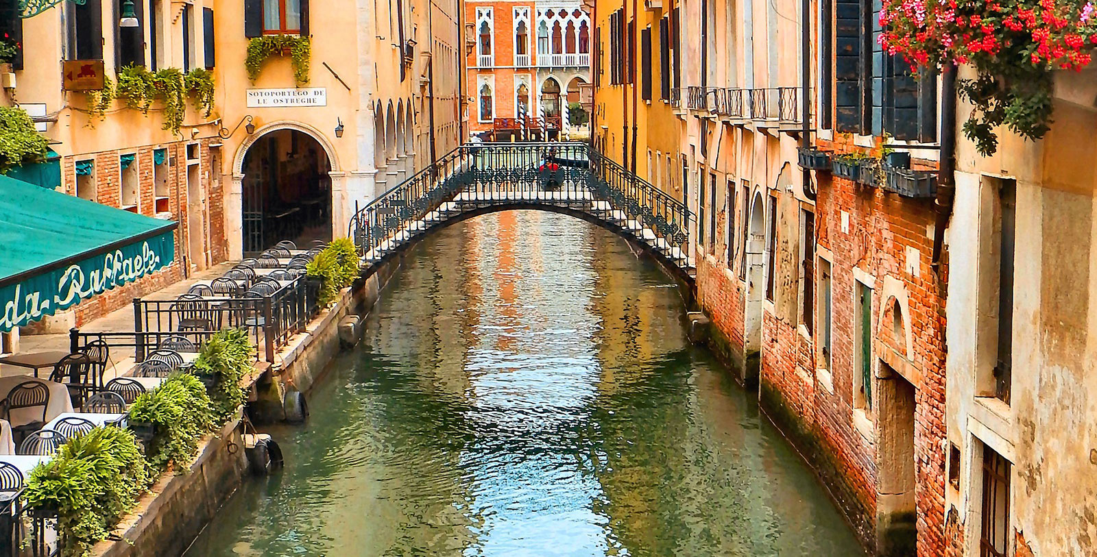 Experience a romantic gondola ride down the majestic Grand Canal.