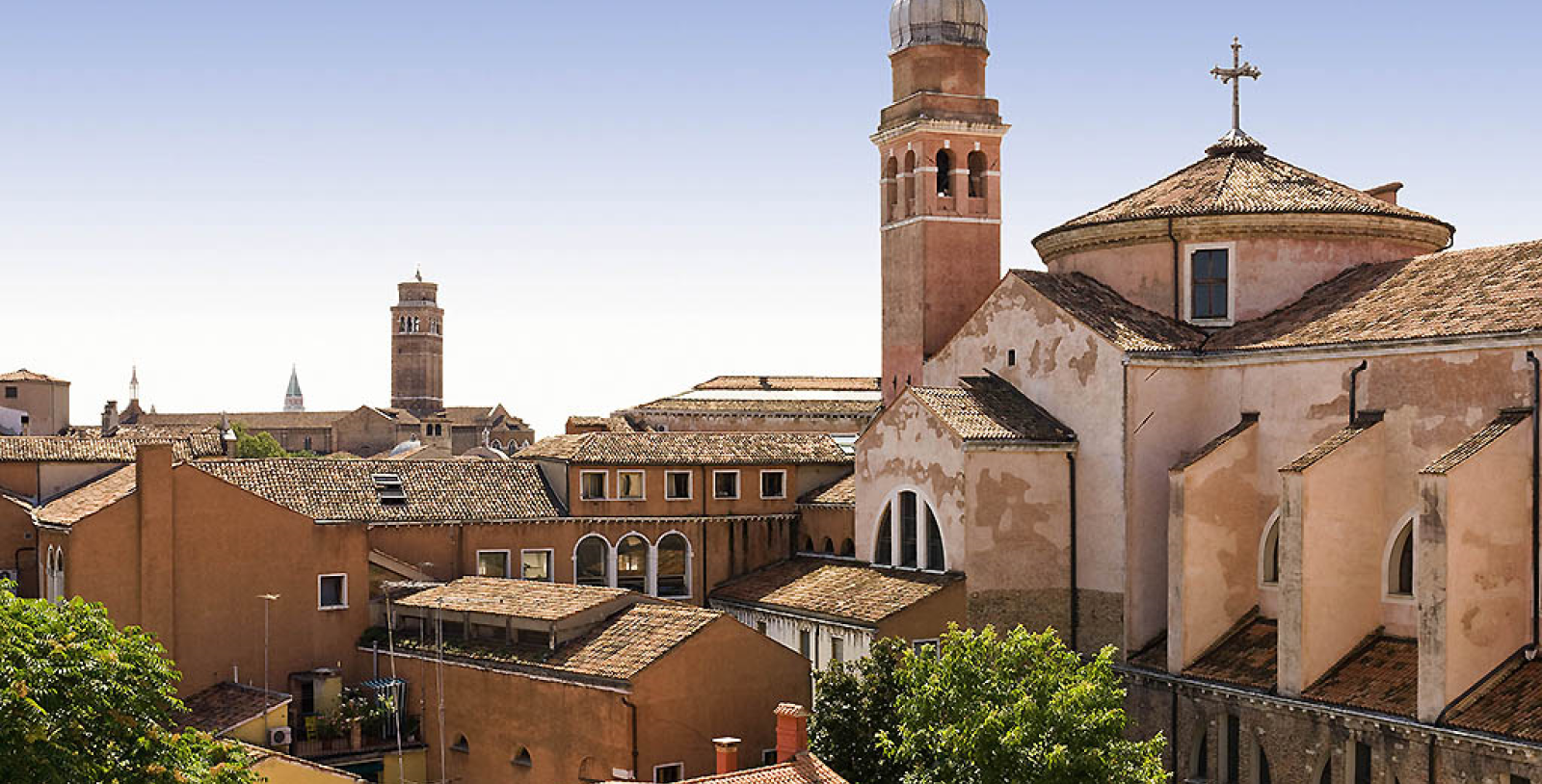 Explore the Scuola Grande di San Rocco and the Scuola Grande dei Carmini nearby.