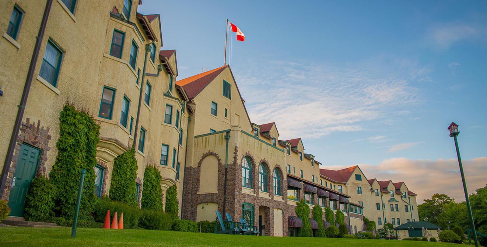 Image of hotel exterior Digby Pines Golf Resort and Spa, 1905, Member of Historic Hotels Worldwide, in Digby, Nova Scotia, Canada, Special Offers, Discounted Rates, Families, Romantic Escape, Honeymoons, Anniversaries, Reunions